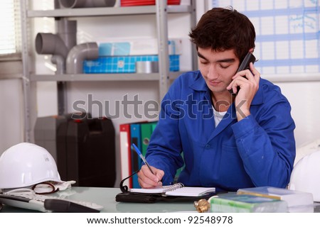 Construction worker arranging an appointment