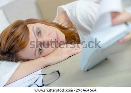 Sad lady slouched on table