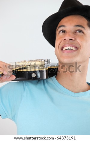 Young man M?tis with electric guitar Photo stock © 