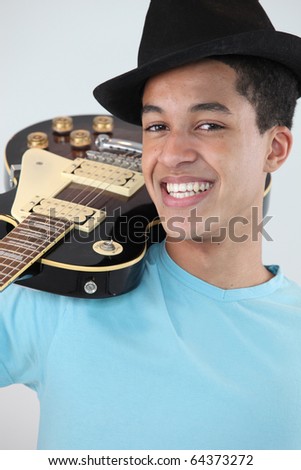 Young man M?tis with electric guitar Photo stock © 