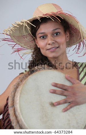 Young M?tis woman with percussions Photo stock © 
