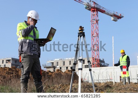 Worker in front of a laptop computer on site Photo stock © 