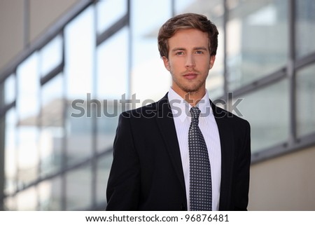 Young salesman in smart suit