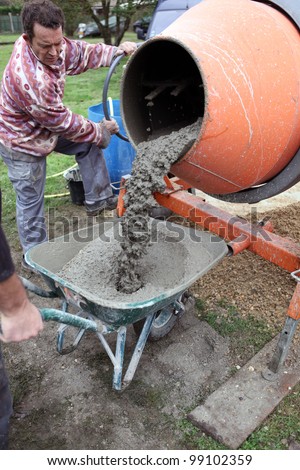 Man with a cement mixer