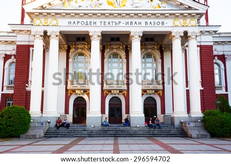 Sofia, Bulgaria - October 11, 2014: Young people sitting on the stairs of the National Bulgarian Theatre Ivan Vazov, situated in the center of Sofia. One of the favourite meeting place in the city.