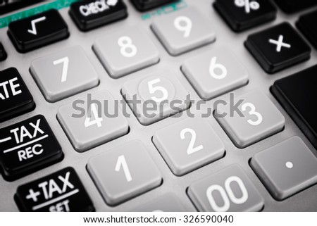 Closeup image of the keypad of a calculator.