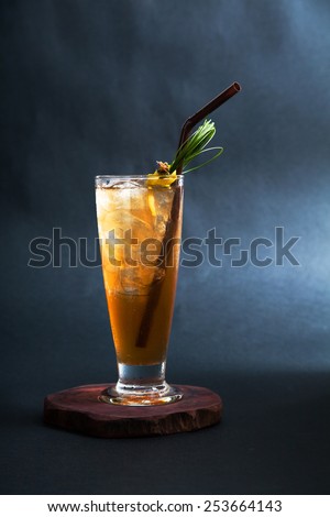 Long island ice tea cocktail isolated on black background