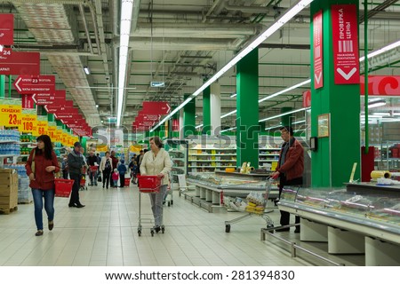 UFA/BASHKORTOSTAN - RUSSIA 24th May 2015 - People shopping in a modern style Russian supermarket in 2015 with a wide range of consumer products