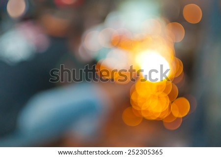 Blurred photo. Bright and dark and colorful. Background out of focus.