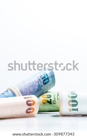 Thai money banknotes on white background. Selective focus point.