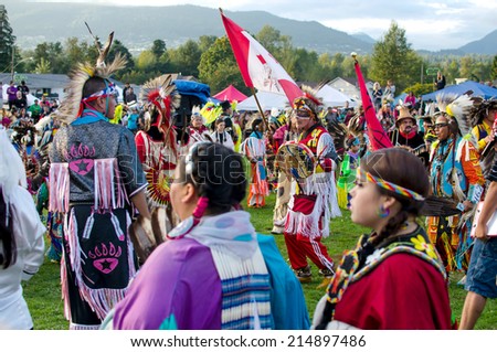 WEST VANCOUVER, BC, CANADA - AUGUST 30 : First Nations Take Part in Grand Entry of the Squamish Nation 27th Annual Pow Wow in West Vancouver, Canada on August 30 2014
