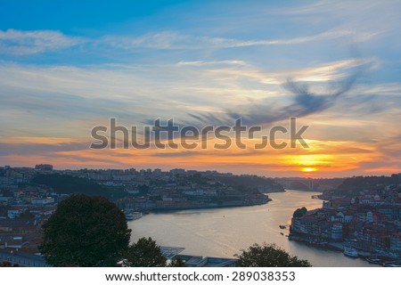 Colorful sunset over Douro river in Porto, Portugal. HDR photography