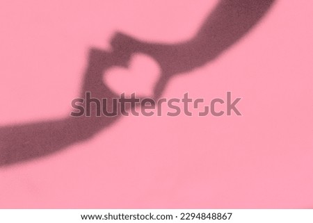 Similar – Image, Stock Photo Two shadows hands in red and green light circle.