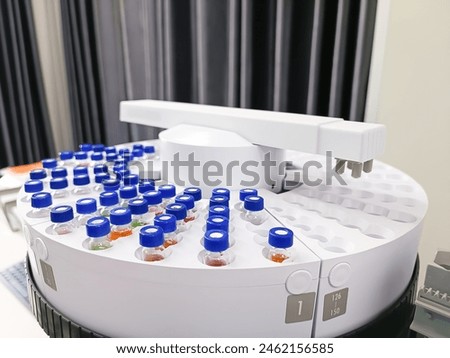 Similar – Image, Stock Photo Vials with scientific samples arranged on glass table