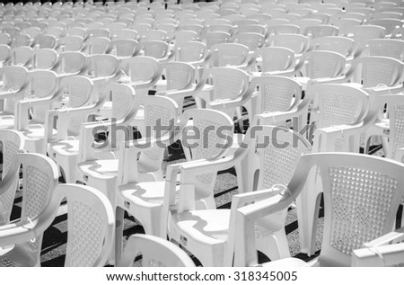 rows of chairs at concert