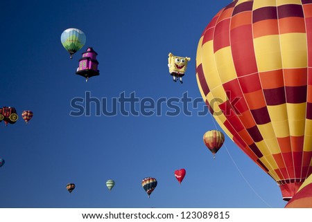 ALBUQUERQUE, NEW MEXICO - OCTOBER 9: Balloons fly over Albuquerque on October 9, 2010 in Albuquerque, New Mexico. Albuquerque balloon fiesta is the biggest balloon event in the the world.