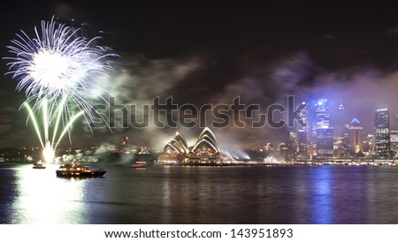 SYDNEY - Jan 1: New Year countdown firework show next to Sydney Opera House in Sydney, Australia on January 1,2012. it is one of the biggest celebration event in the city.