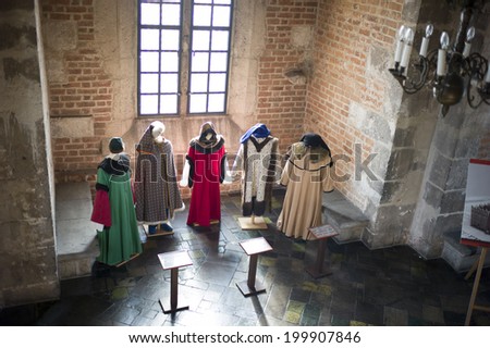 KRAKOW, POLAND - OCT 29: The traditional clothes exhibited in city hall in historic plaza of Krakow, Poland on October 29 2014. It was one of the most historic cities in Poland.