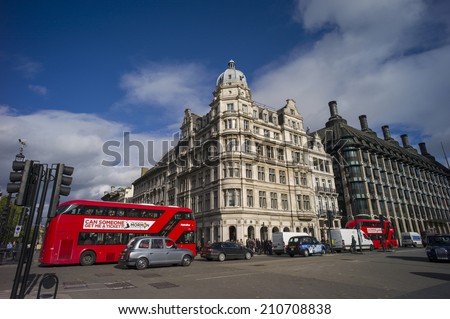 LONDON, UK - NOV 6: The bus in street near Westminster Abbey in London, UK on November 6 2013.