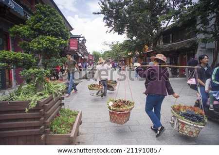 DALI, CHINA - MAY14 : Old buildings and streets located in Dali Old City, Yunnan, China on May 14 2014. Dali is now a major tourist destination for domestic and international tourists