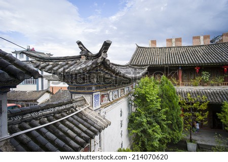 DALI, CHINA - MAY14 : Old buildings and streets located in Dali Old City, Yunnan, China on May 14 2014. Dali is now a major tourist destination for domestic and international tourists.