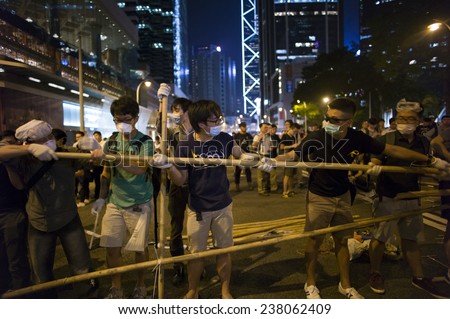HONG KONG - OCT 15: People are building bamboo barricades in the middle of the road in Admiralty during Occupy Central in Hong Kong on October 15 2014.