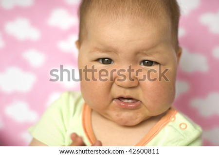Funny baby with only two teeth