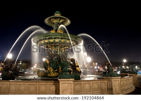 Fountain on Place de la Concorde in Paris at night , France