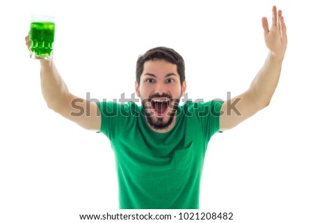Very enthusiastic for the celebration of St Patrick's. Young man wearing green clothes on white background, related to Saint Patrick's day. Photo stock © 