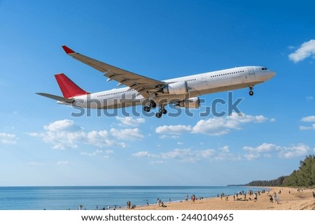 Similar – Image, Stock Photo Airplane landing above beautiful beach and sea background