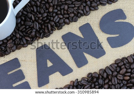 Close-up of Coffee Beans with Partial Beans Label and Cup of Coffee I