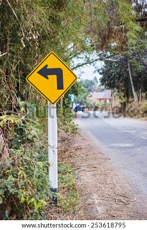The turn left sign post found in rural street