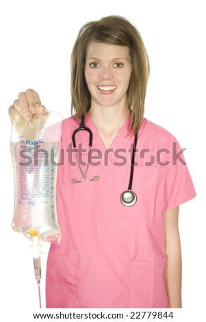 A nurse holds out a bag of IV fluids