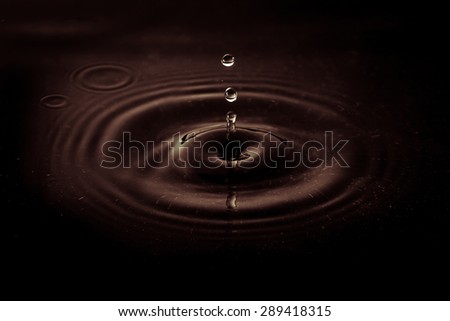 waterdrop with sepia background