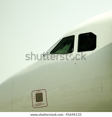 airplane is waiting for departure in pudong airport shanghai china.