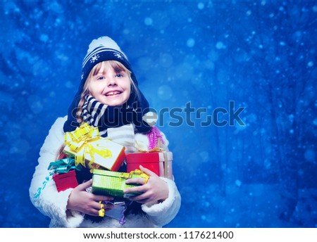 Funny female child with lot of xmas gifts