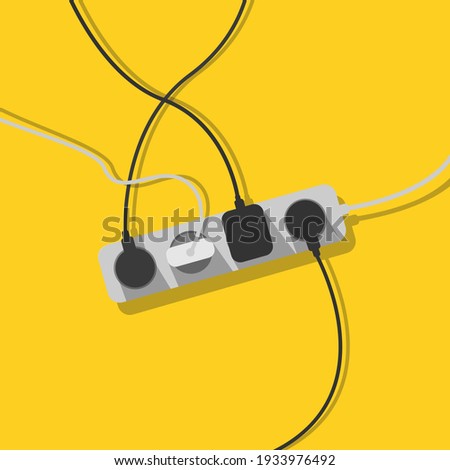Electric extension cord. A mess of cables from extension cord, electrical wires, cords and chargers on a yellow background. Power strip. Cable management. Electric overload.