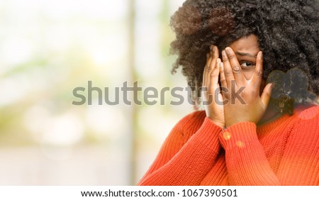 Similar – Image, Stock Photo Cheerful black woman covering eye