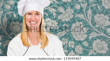 Female Chef against a floral pattern background
