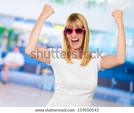 Woman Cheering at the airport