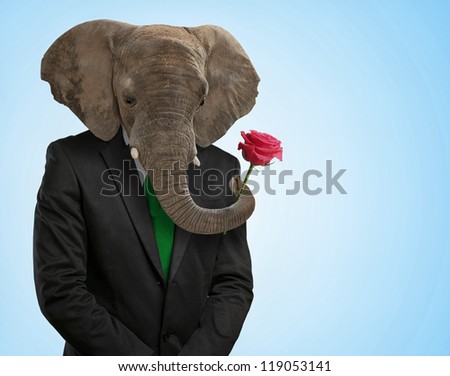 Portrait Of Man With Animal Head On Blue Background