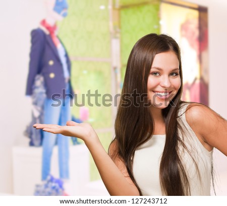 Happy Woman doing a gesture at a shop