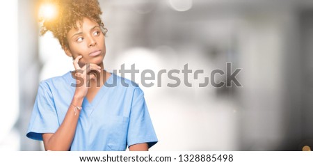 Similar – Image, Stock Photo teenager in uniform wonders about the sharpness of the sickle she is holding in her hand … and at the same time is a little worried she might hurt herself