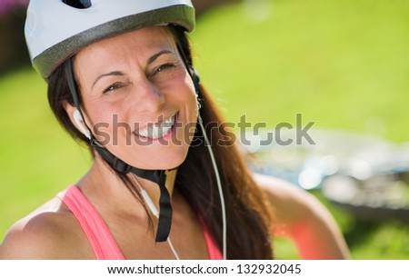 Close-up Of Happy Cyclist Woman