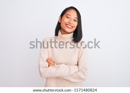 Similar – Image, Stock Photo Young Chinese woman looking at camera with serious expression in a modern office building