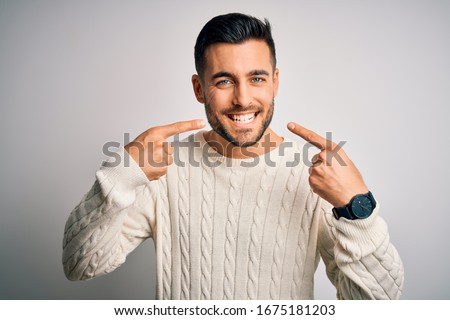 Similar – Image, Stock Photo Young bearded male dentist drilling tooth to female patient