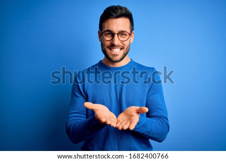 Similar – Image, Stock Photo Male in casual wear standing by a window