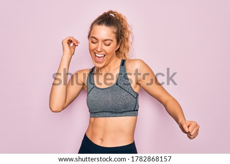 Similar – Image, Stock Photo Cheerful sportswoman smiling and looking at camera