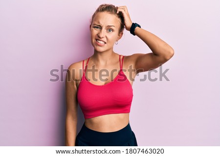 Similar – Image, Stock Photo Thoughtful young female athlete listening to music in studio