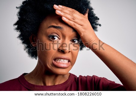 Similar – Image, Stock Photo Upset black woman with dreadlocks against concrete wall